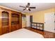 Bedroom with hardwood floors, a ceiling fan, and an abundance of storage at 3310 46Th Ne Ave, Hickory, NC 28601