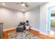 Bedroom showing chair with ottoman and hardwood floors at 3310 46Th Ne Ave, Hickory, NC 28601