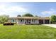 Charming home featuring a welcoming front porch, tidy landscaping, and a two-car garage at 3310 46Th Ne Ave, Hickory, NC 28601