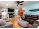 Open-concept living room featuring hardwood floors, a fireplace, and seamless flow to other living spaces at 3310 46Th Ne Ave, Hickory, NC 28601