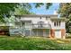 Spacious backyard featuring a patio area and ample green space at 3424 Clydesdale Dr, Gastonia, NC 28056