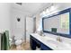 Stylish bathroom with blue accents, a vanity area, and plenty of storage at 3424 Clydesdale Dr, Gastonia, NC 28056