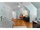 Comfortable bedroom with funky chair, desk, wood floors and ample closet space at 3424 Clydesdale Dr, Gastonia, NC 28056