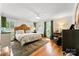 Bright main bedroom with hardwood floors and large windows for lots of natural light at 3424 Clydesdale Dr, Gastonia, NC 28056