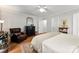 Bright main bedroom with hardwood floors and a large dresser at 3424 Clydesdale Dr, Gastonia, NC 28056