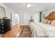 Spacious main bedroom with hardwood floors and an ensuite bathroom at 3424 Clydesdale Dr, Gastonia, NC 28056