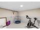 Finished basement with exercise equipment, including bike and trampoline at 366 Faith Rd, Mooresville, NC 28115
