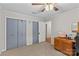 Bedroom features a ceiling fan and closet at 366 Faith Rd, Mooresville, NC 28115