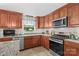 Modern kitchen featuring granite countertops, stainless steel appliances, and custom cabinetry at 366 Faith Rd, Mooresville, NC 28115