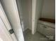 Bathroom features tile flooring and awaiting vanity installation at 4017 Grommet Ct, Matthews, NC 28105