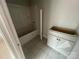 An unfinished bathroom with a tub and vanity at 4017 Grommet Ct, Matthews, NC 28105