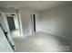 Bright bedroom features a closet and adjacent bathroom, perfect for comfortable living at 4017 Grommet Ct, Matthews, NC 28105