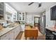Bright kitchen with stainless steel appliances, butcher block island, and lots of storage at 404 N Laurel St, Lincolnton, NC 28092