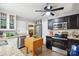 Well-lit kitchen featuring stainless steel appliances, granite countertops, and white and black cabinetry for a modern feel at 404 N Laurel St, Lincolnton, NC 28092