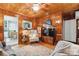 Warm living room showcasing wooden paneling, vintage decor, and open layout at 404 N Laurel St, Lincolnton, NC 28092