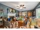 Spacious living room with a fireplace, unique rug, and classic furnishings at 404 N Laurel St, Lincolnton, NC 28092