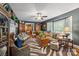Cozy living room with decorative fireplace, comfortable seating, and lots of natural light at 404 N Laurel St, Lincolnton, NC 28092