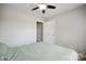 This bedroom features a ceiling fan and a closet at 4301 Windjammer Sw Ct, Concord, NC 28027