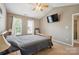 This main bedroom offers lots of natural light and ceiling fan at 4301 Windjammer Sw Ct, Concord, NC 28027