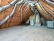 Unfinished attic with exposed rafters, ductwork, and ample space for storage or future expansion at 4562 Lanstone Sw Ct, Concord, NC 28027