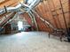 Unfinished attic with exposed ductwork, open stud walls, and plenty of space for storage at 4562 Lanstone Sw Ct, Concord, NC 28027