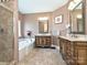 A bathroom featuring tile floors, tub, shower, and double vanity with granite counters at 4562 Lanstone Sw Ct, Concord, NC 28027