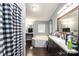 Bathroom with vanity, shower with curtain, and soaking tub at 4845 Midway Sand Rd, Hickory, NC 28601