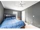 Comfortable bedroom with a ceiling fan and a window bringing in natural light at 4845 Midway Sand Rd, Hickory, NC 28601