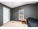 Bedroom featuring neutral carpet and a window bringing in natural light at 4845 Midway Sand Rd, Hickory, NC 28601