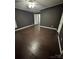 Bedroom with hardwood flooring, white trim, and neutral wall color at 4845 Midway Sand Rd, Hickory, NC 28601