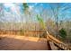 The wooden deck features railings, ensuring safety while providing a beautiful view of the surroundings at 4845 Midway Sand Rd, Hickory, NC 28601