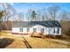 Inviting one-story home with a covered porch, black shutters, and a well-maintained lawn, perfect for suburban living at 4845 Midway Sand Rd, Hickory, NC 28601