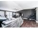 Living room with wood floors, comfortable seating, and slider access to deck at 4845 Midway Sand Rd, Hickory, NC 28601