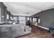 Cozy living room with hardwood floors, plush seating, and a serene atmosphere, ideal for relaxation and entertainment at 4845 Midway Sand Rd, Hickory, NC 28601