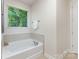 Bright bathroom with tub and tile at 5065 Watersail Way, Clover, SC 29710
