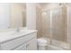 Bathroom with glass-door shower, and white cabinets at 5065 Watersail Way, Clover, SC 29710