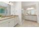 Bathroom with double sinks, granite countertops, and a glass-enclosed shower at 5065 Watersail Way, Clover, SC 29710