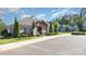 Exterior view of the clubhouse with parking and landscaping at 5065 Watersail Way, Clover, SC 29710