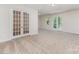 Open floor plan in living room featuring french doors and lots of natural light at 5065 Watersail Way, Clover, SC 29710