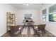 Well-lit home office featuring wood floors, neutral walls, a large window, and stylish furnishings at 5065 Watersail Way, Clover, SC 29710