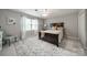 Serene bedroom featuring a dark wood bed frame, neutral decor, and natural light at 5135 Winding Brook Rd, Charlotte, NC 28226