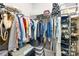 Walk in closet with custom organization and shelving at 5648 Woodard St, Charlotte, NC 28269