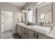 Stylish bathroom boasts a dual sink vanity, marble floors, and modern fixtures at 624 Heather Ln, Charlotte, NC 28209