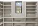 Bonus room with built-in shelving and modern window at 624 Heather Ln, Charlotte, NC 28209