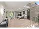Open concept kitchen with large island, pendant lighting, and modern appliances adjacent to dining area at 624 Heather Ln, Charlotte, NC 28209
