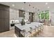 Spacious kitchen features a large island with seating, modern appliances, and sleek cabinetry at 624 Heather Ln, Charlotte, NC 28209