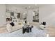 Spacious living room with hardwood floors and seamless transition to kitchen at 624 Heather Ln, Charlotte, NC 28209
