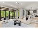 Bright living room with access to patio, hardwood floors, and modern design at 624 Heather Ln, Charlotte, NC 28209