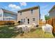 A backyard with outdoor furniture and a grill perfect for entertaining at 6430 Matlea Ct, Charlotte, NC 28215