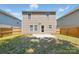 A spacious backyard boasts a patio, privacy fence, and ample green space at 6430 Matlea Ct, Charlotte, NC 28215